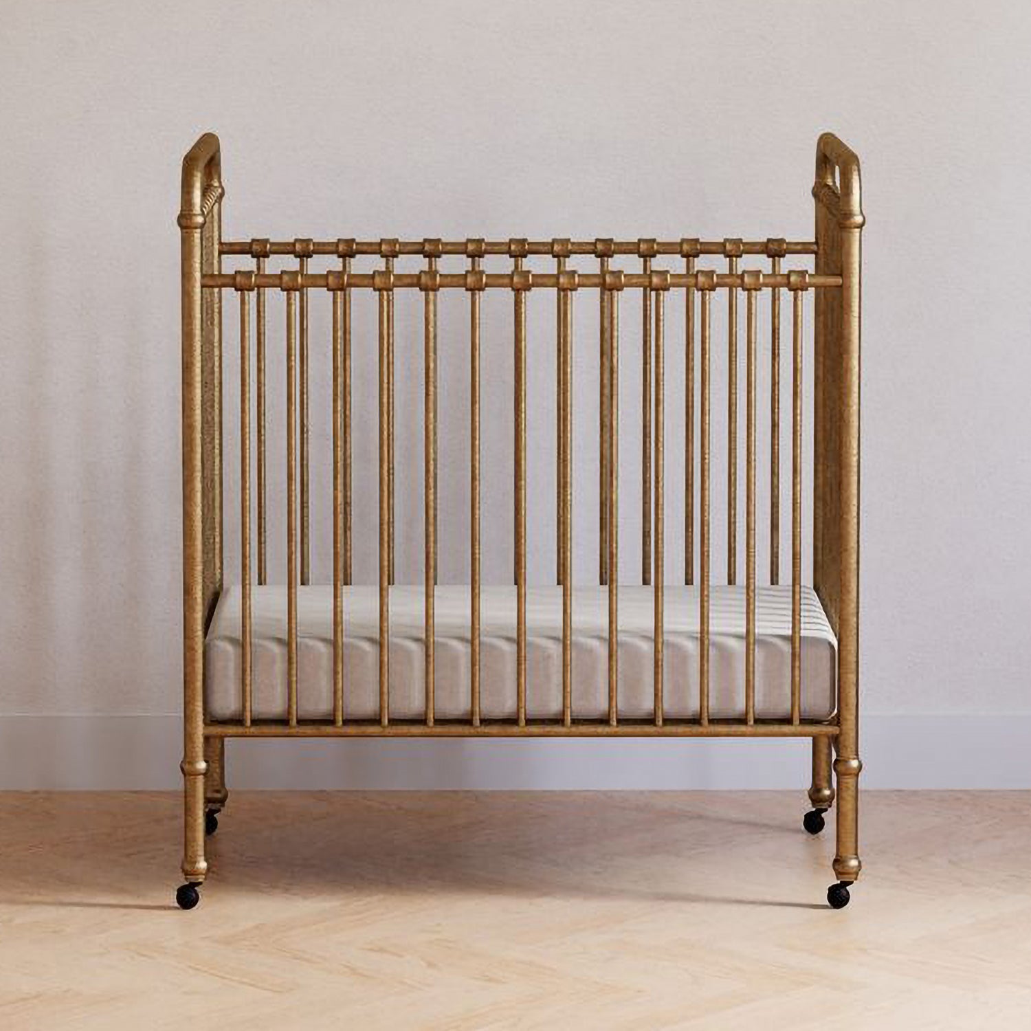 M15598VG,Abigail 3-in-1 Convertible Mini Crib in Vintage Gold